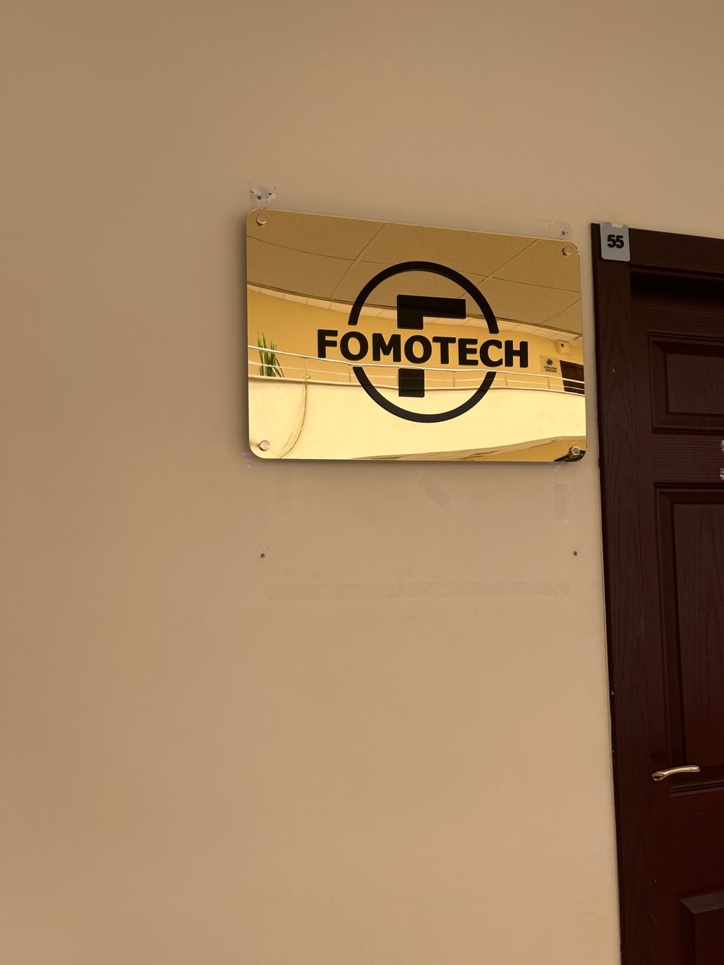 FOMOTECH office sign